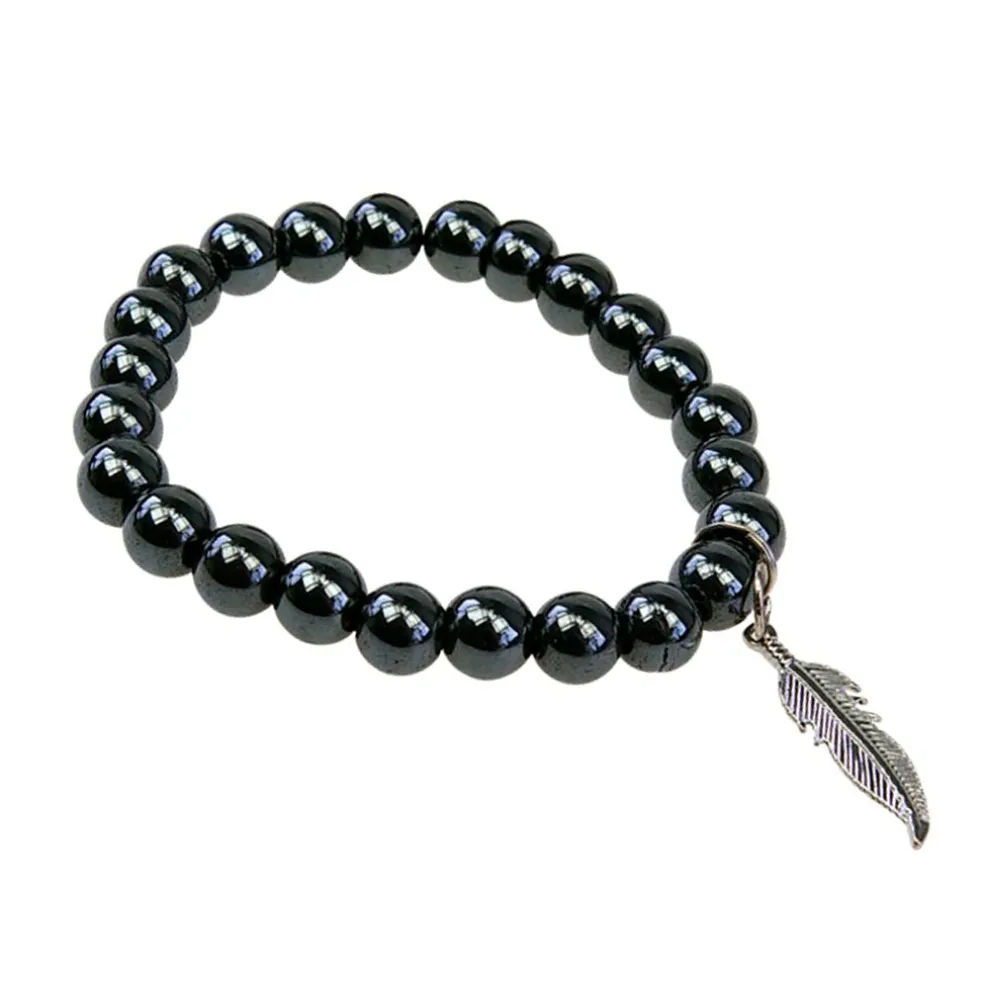 Bracelet hématite perles rondes 8mm et plume