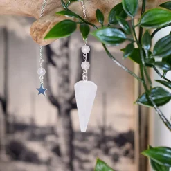 Pendule hexagonal en cristal de roche et charm étoile