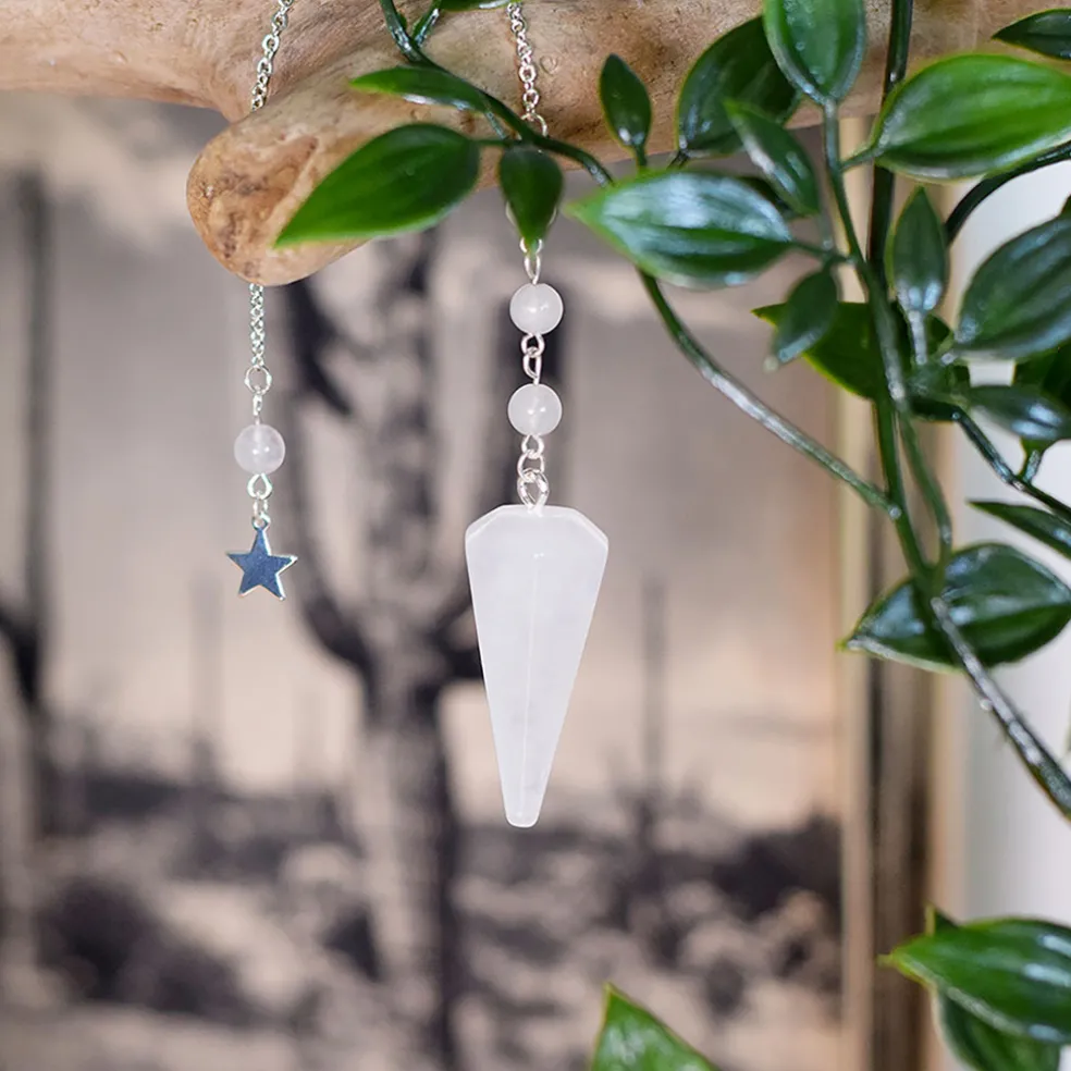 Pendule hexagonal en cristal de roche et charm étoile