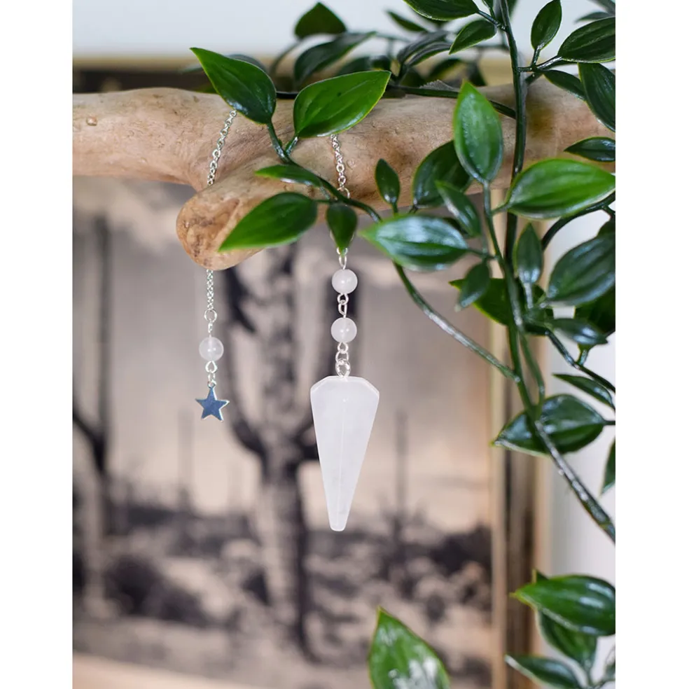 Pendule hexagonal en cristal de roche et charm étoile